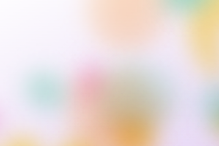Soft pastel gradient background with blurred circles of pink, orange, teal, yellow, and green blending into each other. Generated on Meld.